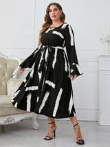 Aleah Plus Size Printed Tie Belt Flare Sleeve Round Neck Midi Dress